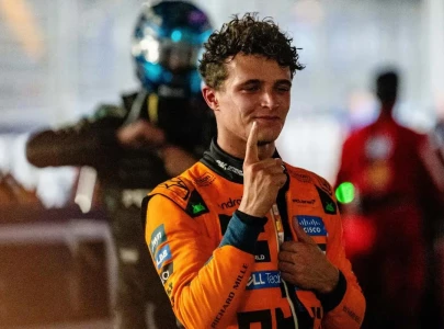 norris faces nerve shredding three way scrap to claim maiden title norris faces nerve shredding three way scrap to claim maiden title