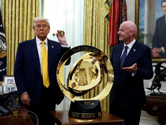 u s president donald trump and fifa president gianni infantino stand next to the fifa club world cup trophy in the oval office of the white house in washington d c u s march 7 2025 photo reuters u s president donald trump and fifa president gianni infantino stand next to the fifa club world cup trophy in the oval office of the white house in washington d c u s march 7 2025 photo reuters