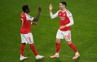 mikel merino and bukayo saka were on target as arsenal kept the initiative in the premier league title race with a routine 2 0 win over brentford photo afp