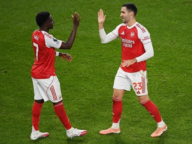 mikel merino and bukayo saka were on target as arsenal kept the initiative in the premier league title race with a routine 2 0 win over brentford photo afp