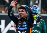 lando norris waves to his fans as he contemplates the magnitude of his achievement photo afp