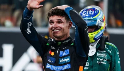 lando norris waves to his fans as he contemplates the magnitude of his achievement photo afp
