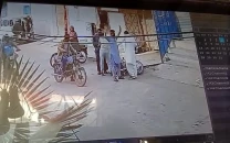 armed men loot rs1 8m from citizens in daytime in landhi