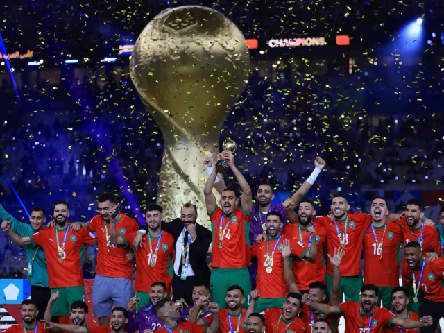 morocco players and coach tarik sektioui celebrate on the podium as soufiane bouftini lifts the trophy photo reuters morocco players and coach tarik sektioui celebrate on the podium as soufiane bouftini lifts the trophy photo reuters