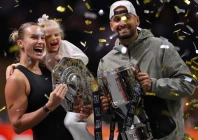 aryna sabalenka and nick kyrgios celebrate with trophies after the match photo reuters