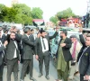lawyers stage protest on ma jinnah road on tuesday over registration of fir against lawyers who allegedly attacked youtuber rajab butt in the city courts premises on monday photo express