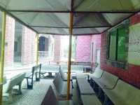 untidy cement and iron benches reflect inadequate facilities at the rawalpindi judicial complex for separated parents and children photo express