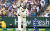 emotional khawaja bows out