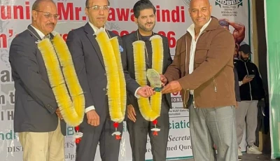 naeem butt of the rawalpindi district bodybuilding association presents a shield to pakistan muslim league n leader usama chaudhry