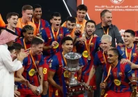 barcelona celebrate their 3 2 victory over real madrid photo afp