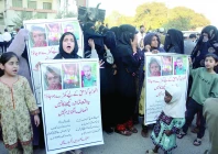 traffic comes to a standstill on garden nishtar road as families along with kids protest a year of police inaction demanding justice and the safe return of aliyan and ali raza photo jalal qureshi express