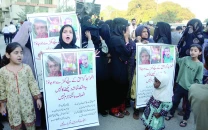 protest after year long mystery of missing kids