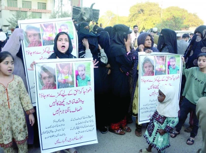 protest in karachi after year long mystery of missing kids