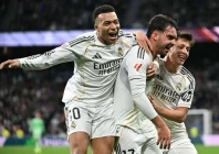 real madrid s raul asencio centre celebrates with kylian mbappe and arda guler after scoring against levante photo afp