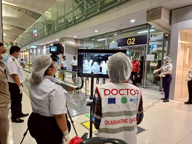 airport health authorities wearing protective masks monitor passengers from international flights arriving at suvarnabhumi international airport in bangkok thailand on january 25 2026 photo reuters airport health authorities wearing protective masks monitor passengers from international flights arriving at suvarnabhumi international airport in bangkok thailand on january 25 2026 photo reuters