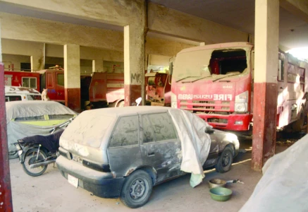 while alarms echo across the city the fire brigade s rusty rides sleep quietly at the department s headquarters photo express