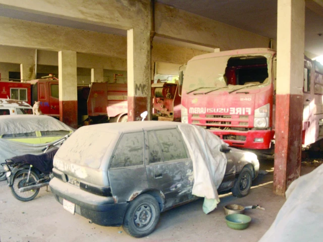 while alarms echo across the city the fire brigade s rusty rides sleep quietly at the department s headquarters photo express while alarms echo across the city the fire brigade s rusty rides sleep quietly at the department s headquarters photo express