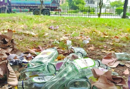 liquor bottles lie littered outside an excise liquor shop in dha on korangi road photo express