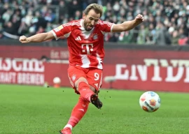 harry kane blasts home bayern munich s second goal against werder bremen his 13th from the spot this season photo afp