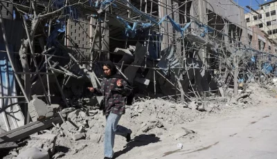 a woman walks on the street following an israeli and u s strike on a police station amid the us israeli conflict with iran in tehran iran march 3 2026 photo reuters