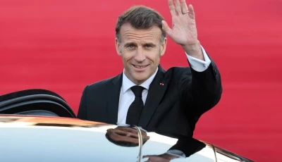 french president emmanuel macron waves to media as he leave seoul air base in seongnam south korea on april 2 2026 photo reuters