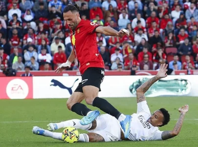 mallorca deal blow to real madrid s title hopes with late winner