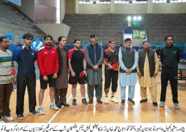 chief guest provincial minister for sports taj muhammad khan trand poses for a group photo with the tabletannis players in peshawar sports complex photo express