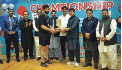 advisor to the khyber pakhtunkhwa chief minister on sports and youth affairs taj muhammad tarand awards trophy to the winning player photo express