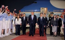 trump lands in beijing for high stakes china visit
