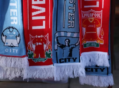 liverpool match looms for manchester city at anfield