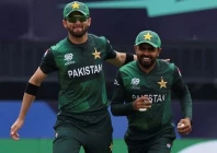pakistan s babar azam celebrates with shaheen shah afridi after taking the wicket of india s rishabh pant photo reuters