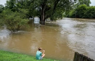 chace dexter 13 films the swollen white river due to flooding after days of heavy rain in noblesville indiana united states august 15 2026 photo reuters
