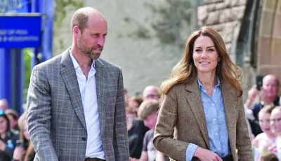 prince william and his wife kate photo file