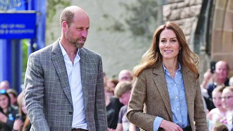 prince william and his wife kate photo file