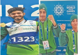 pakistan s muneeb ur rehman and rovina qurban pose for the camera with their gold and silver medals at the 12th special olympic world winter games right moazzam iqbal shows off his gold photos sop