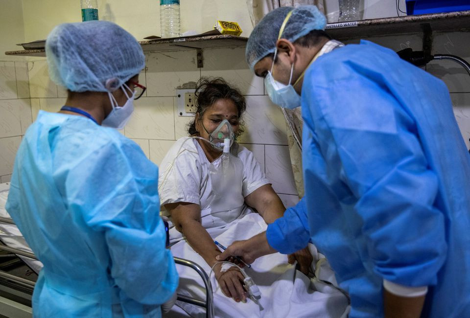 rohan aggarwal 26 a resident doctor treating patients suffering from the coronavirus disease covid 19 tends to a patient inside the emergency room of holy family hospital during his 27 hour shift in new delhi india may 1 2021 aggarwal says he fears what will happen if he gets infected too knowing that his own hospital will be unlikely to find him a bed he is unvaccinated he was sick in january when shots for medical professionals were being rolled out and then by february he began to relax we were all under the misconception the virus had gone he said reuters