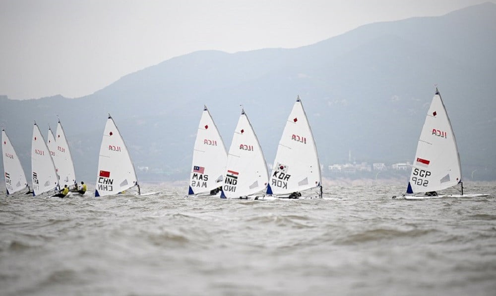 Athletes compete in the women's single dinghy ILCA6 at the 19th Asian Games in Ningbo, east China's Zhejiang Province on Sept. 22, 2023. PHOTO: XINHUA