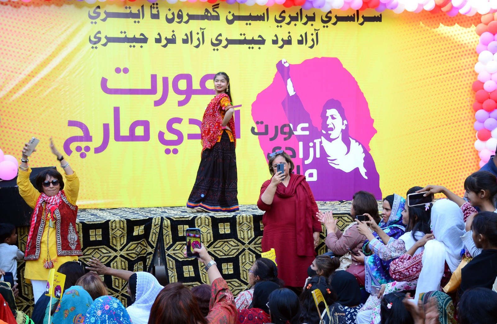 a girl presents tableau at the aurat azadi march in hyderabad on friday march 8 2024 the banner reads how much equality do we demand as much as a free person photo express