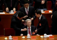 former chinese premier zhu rongji c leaves after the opening of the 19th national congress of the communist party of china at the great hall of the people in beijing china october 18 2017 reuters