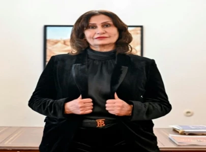 afghan woman defies taliban govt