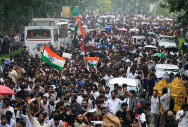 supporters of the cockroach janta party march toward parliament on the opening day of its monsoon session demanding the resignation of education minister dharmendra pradhan over exam paper leaks in new delhi india 20 july 2026 reuters