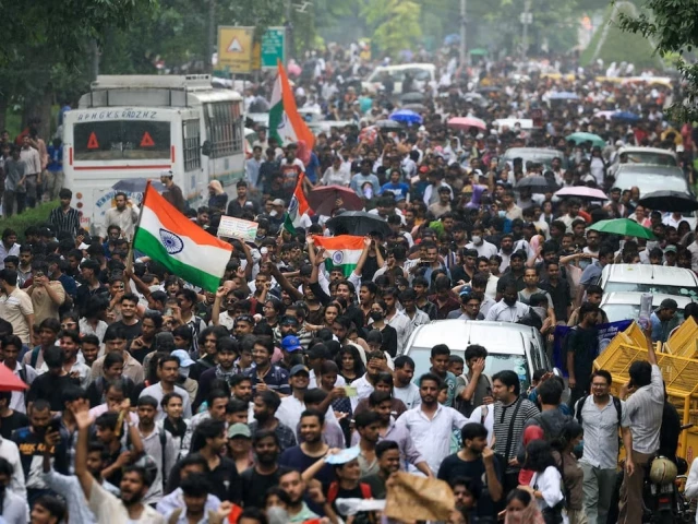supporters of the cockroach janta party march toward parliament on the opening day of its monsoon session demanding the resignation of education minister dharmendra pradhan over exam paper leaks in new delhi india 20 july 2026 reuters supporters of the cockroach janta party march toward parliament on the opening day of its monsoon session demanding the resignation of education minister dharmendra pradhan over exam paper leaks in new delhi india 20 july 2026 reuters