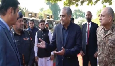 interior minister mohsin naqvi speaks with k p governor faisal karim kundi at a ceremony to hand over armoured vehicles to the k p police at the governor house photo express screengrab