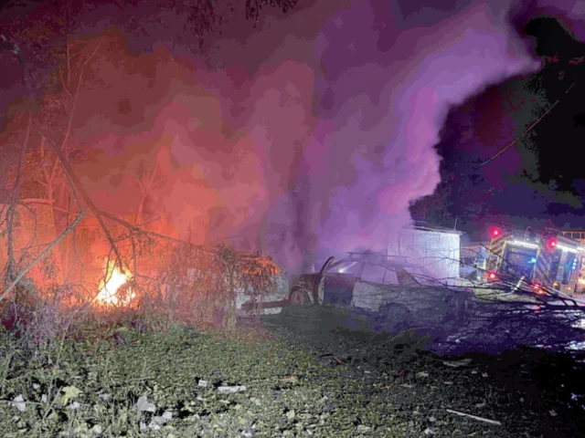 rescuers put out a fire outside a residential building damaged following a russian missile attack in zaporizhzhia ukraine photo afp rescuers put out a fire outside a residential building damaged following a russian missile attack in zaporizhzhia ukraine photo afp
