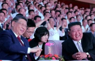 chinese president xi jinping sits next to north korean leader kim jong un as he attends a performance at the pyongyang indoor stadium during his state visit in pyongyang north korea on june 8 2026 photo kcna via reuters
