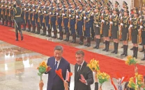 macron urges xi to step up peace efforts