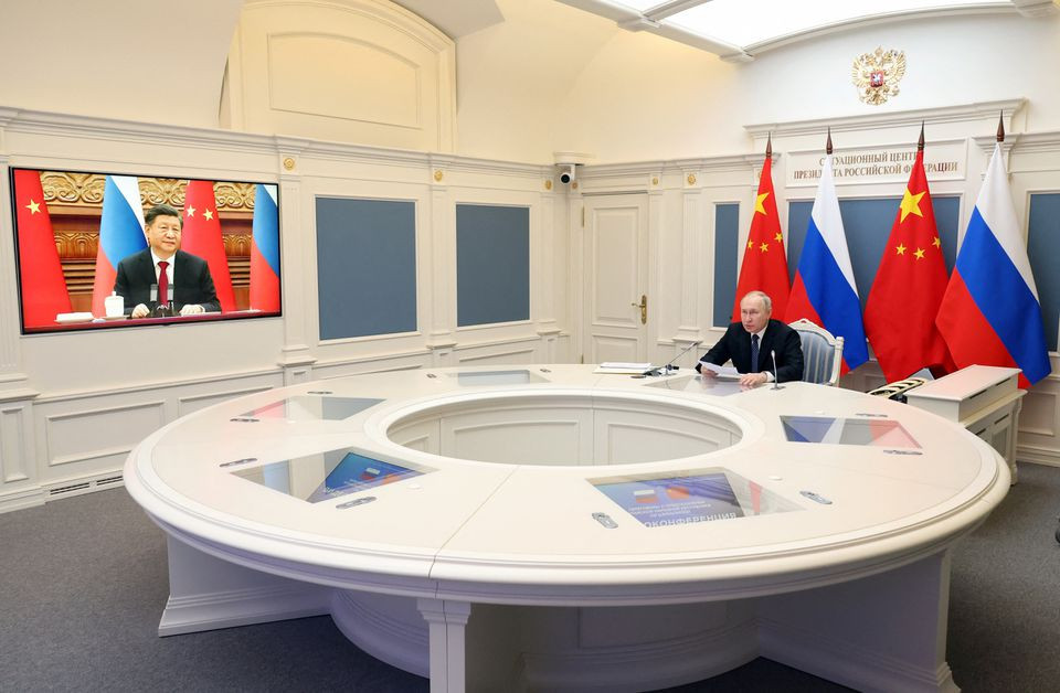 russia s president vladimir putin holds talks with china s president xi jinping via a video link from moscow russia december 30 2022 photo reuters