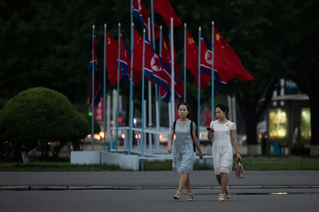 China's President Xi Jinping is heading to North Korea for a historic visit to reboot a troubled alliance. PHOTO: AFP