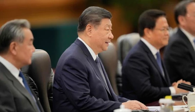 chinese president xi jinping 2nd l talks to finland s prime minister petteri orpo not pictured during their bilateral meeting at the great hall of the people in beijing on january 27 2026 photo afp