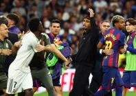 barcelona s lamine yamal and real madrid s vinicius junior clash after the match photo reuters